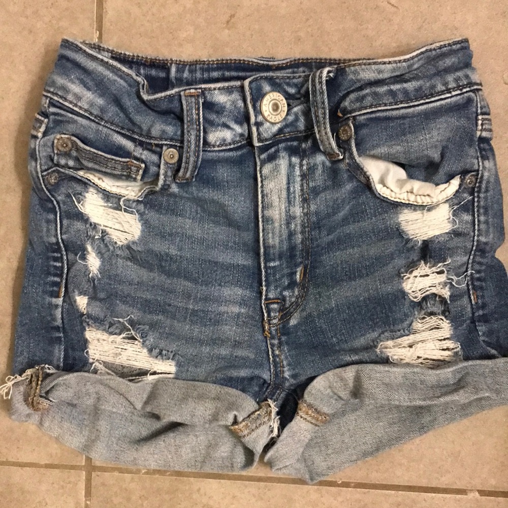 GENTLY USED AE Hi Rise Shortie Next Level Stretch in medium wash distressed